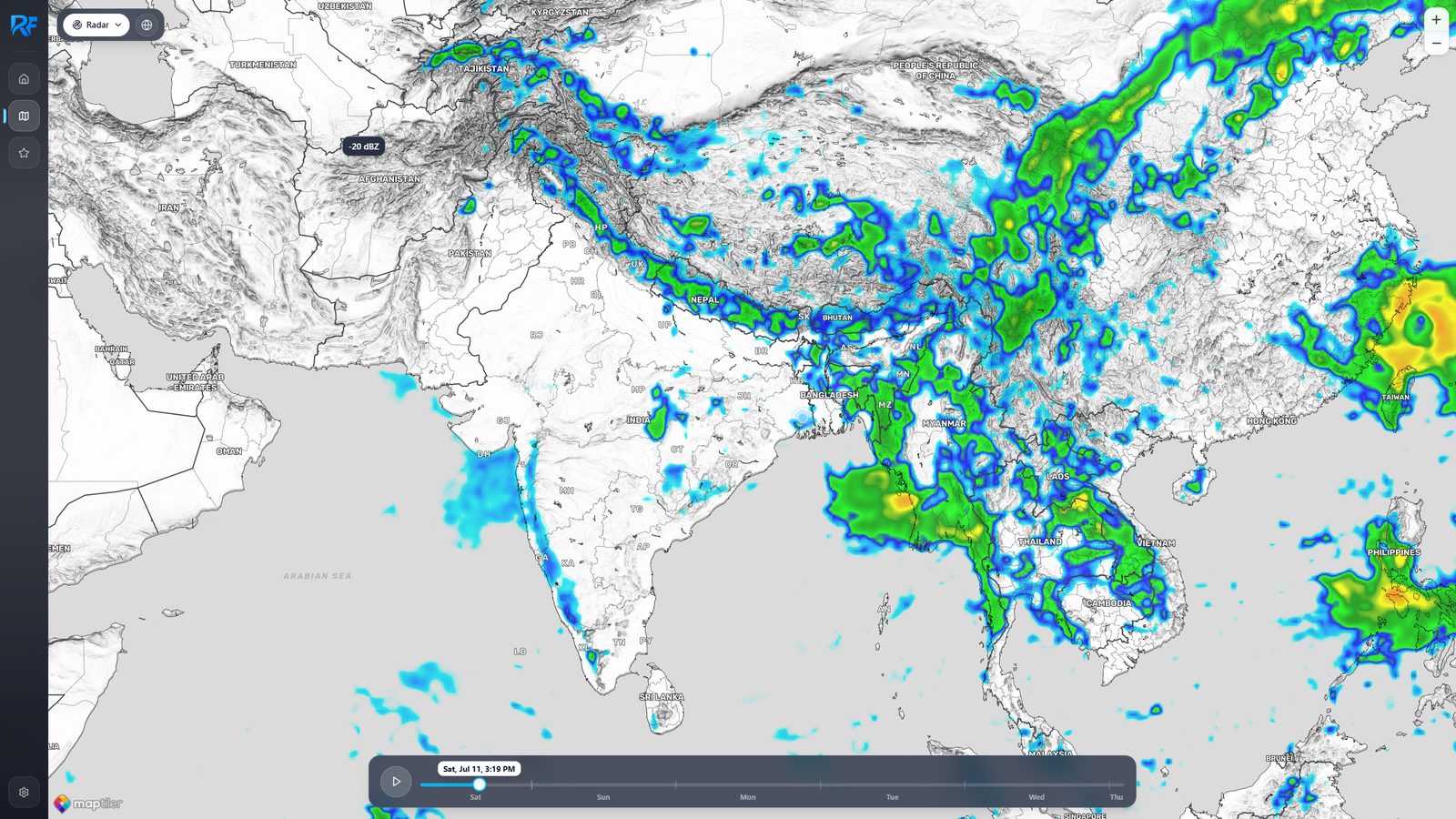 Radar layer showing precipitation echoes in blue, green, and yellow across South and Southeast Asia, with a timeline scrubber at the bottom